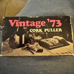 Vintage '73 Cork Puller - Classic Black and White Design